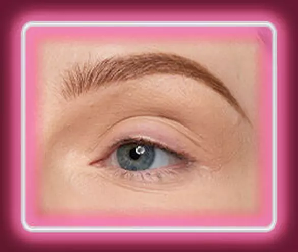 Close-up of an eye with NYX Professional Makeup Lid Lingerie Cream Eye Pigment in 03 Beige blended through the crease.