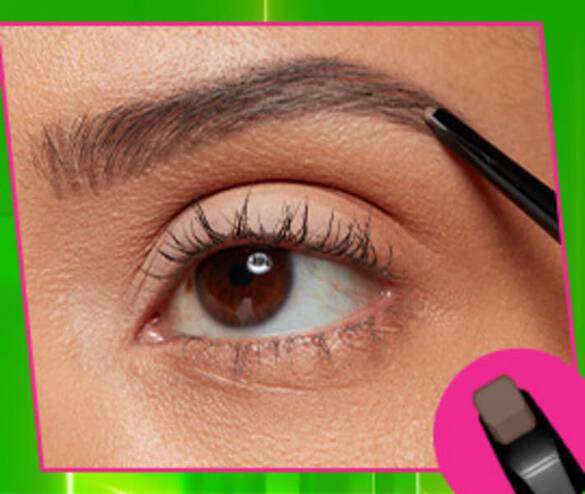 Close-up of a woman\'s eye as she fills in her eyebrow with a pencil, showcasing precise brow grooming techniques.