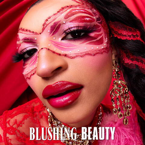 Blushing Beauty section featuring NYX Royal Epic Ink Liner Glitz on a red floral background.