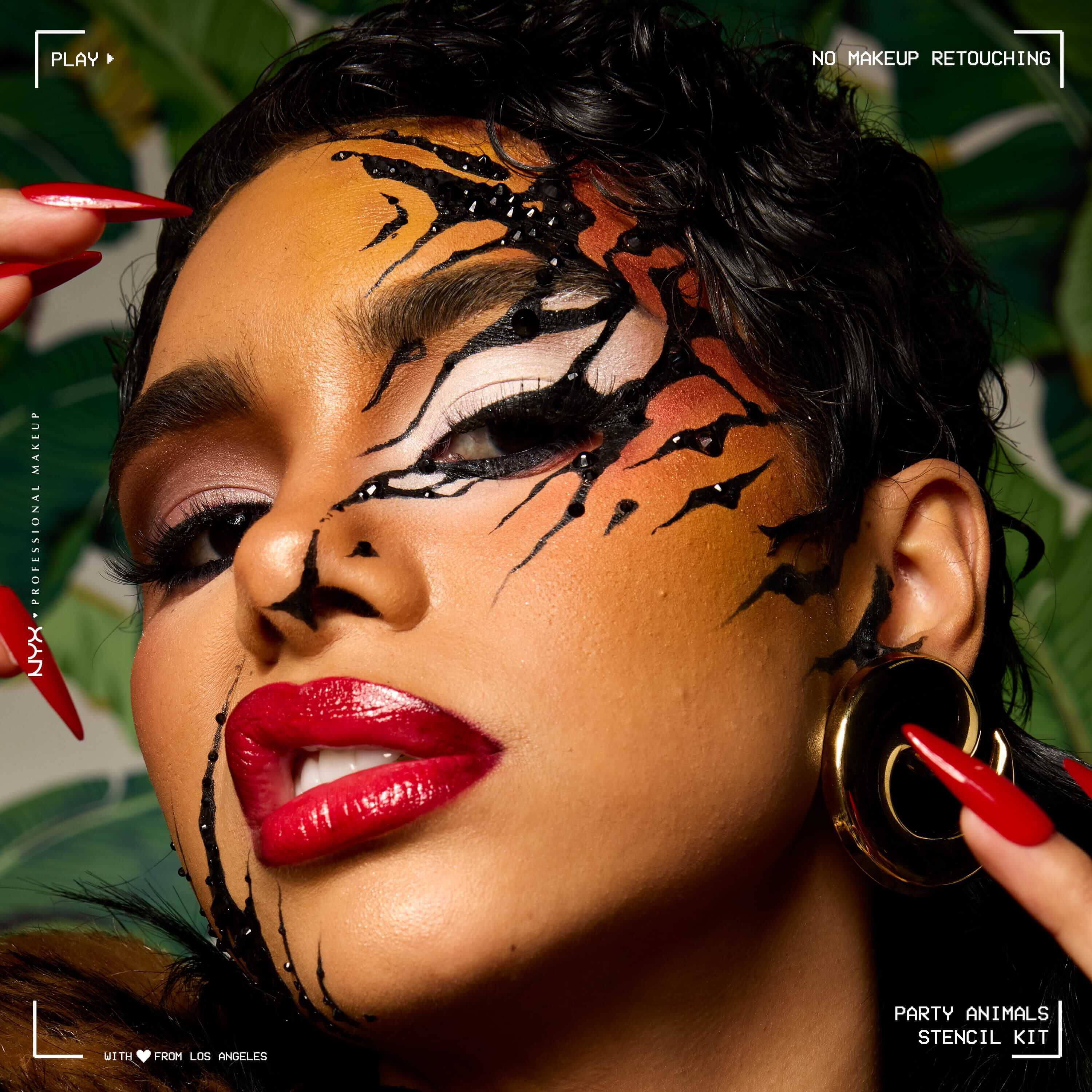 Model wearing bold animal-inspired black face stencil makeup with red lipstick, created using NYX Professional Makeup Party Animals Stencils Kit.